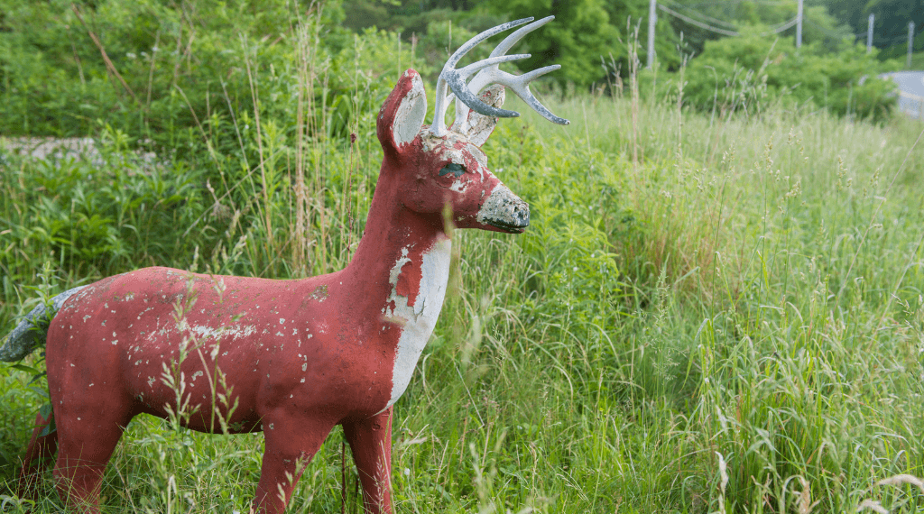 A 3D target standing in high grass.