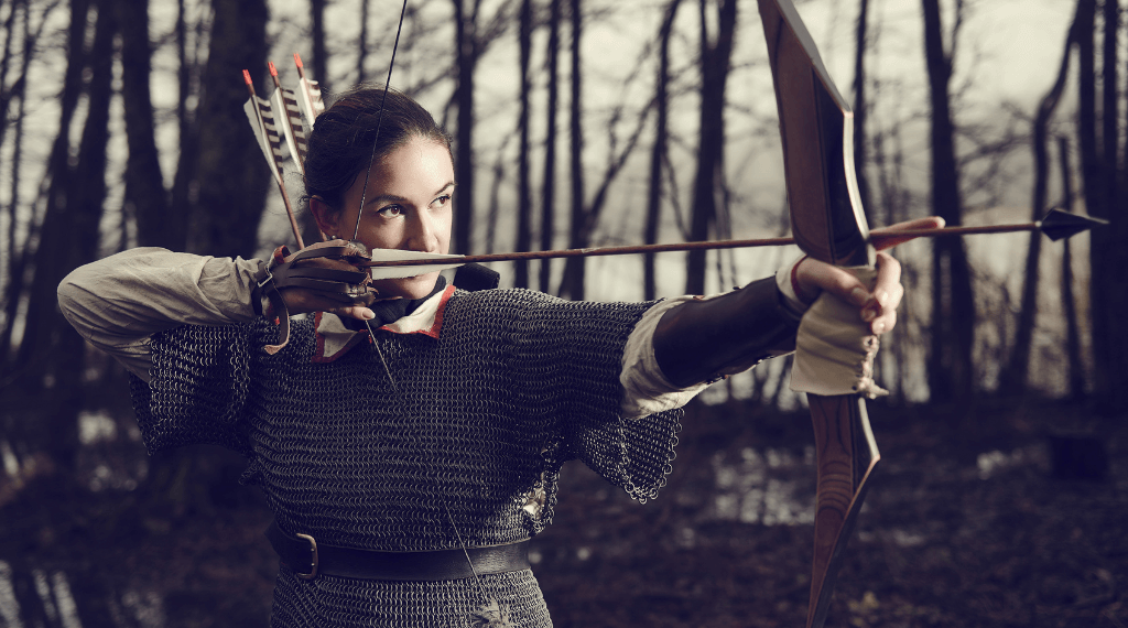 A woman practicing medieval archery.